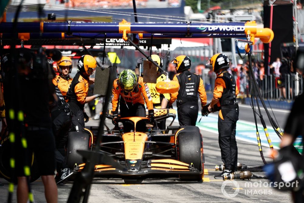 Lando Norris, McLaren MCL38, retires in the pit lane after contact with Max Verstappen, Red Bull Racing RB20, whilst battling for the lead