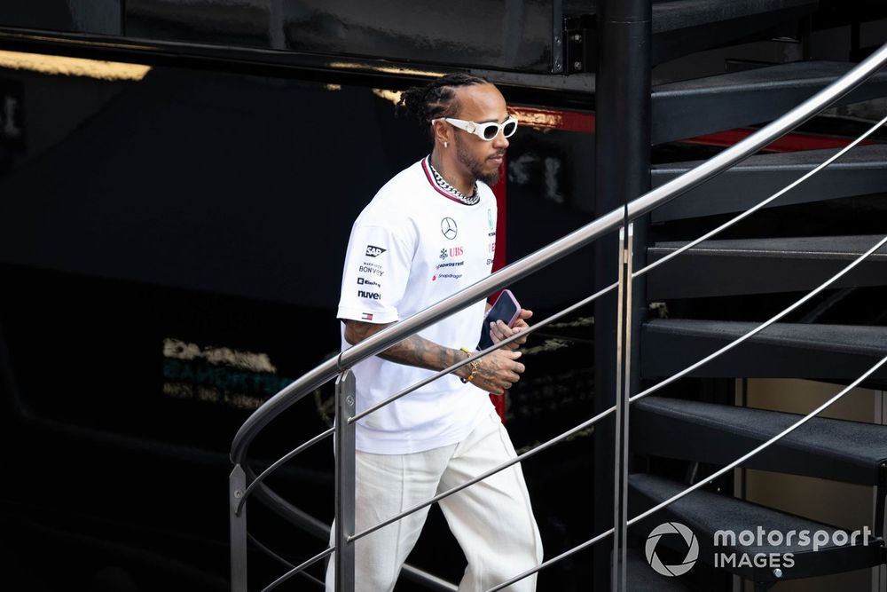 Sir Lewis Hamilton, Mercedes-AMG F1 Team, walks up the stairs of the Mercedes AMG hospitality unit