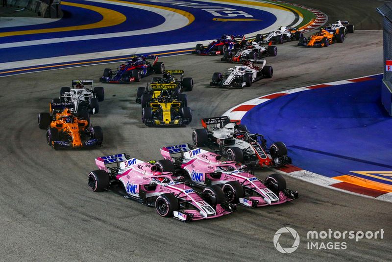 Esteban Ocon, Racing Point Force India VJM11, Sergio Perez, Racing Point Force India VJM11 and Romain Grosjean, Haas F1 Team VF-18 