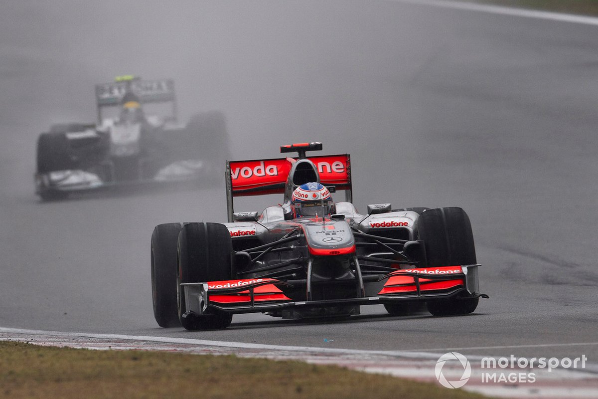 Jenson Button, McLaren MP4-25 Mercedes leads Nico Rosberg, Mercedes GP W01