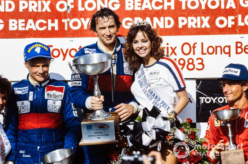 Podium: race winner John Watson, second place Niki Lauda, third place René Arnoux