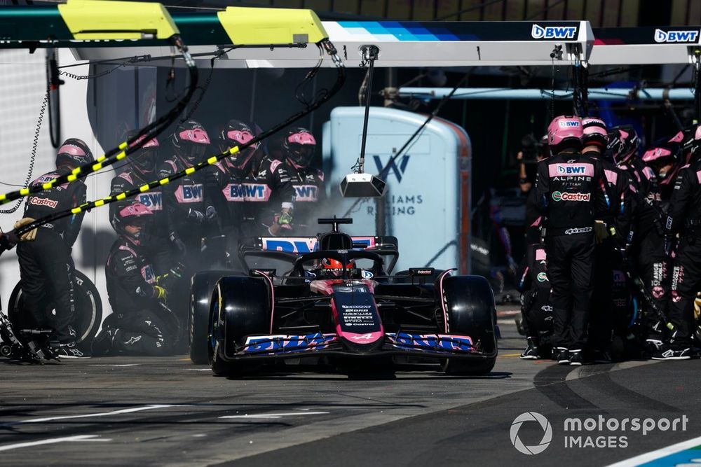 Esteban Ocon, Alpine A524, leaves his pit box after a stop