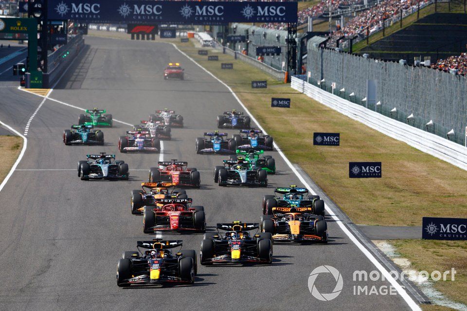 Max Verstappen, Red Bull Racing RB20 Sergio Perez, Red Bull Racing RB20, Lando Norris, McLaren MCL38, the rest of the field away