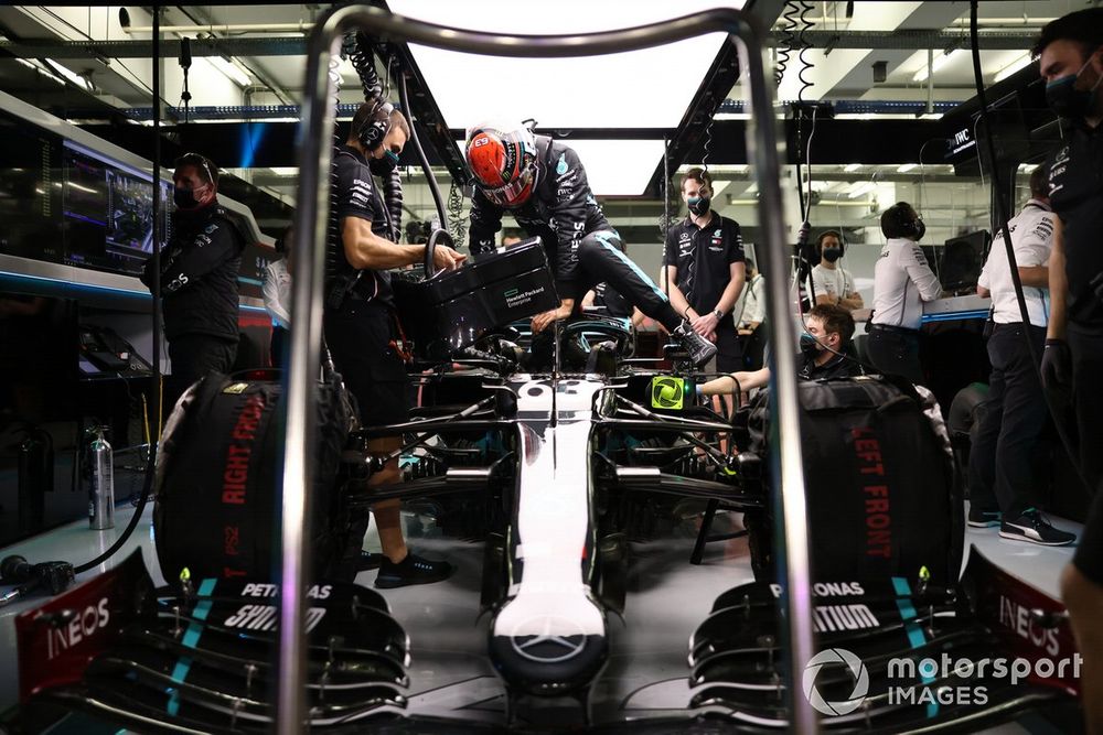 George Russell, Mercedes-AMG F1, climbs into his cockpit