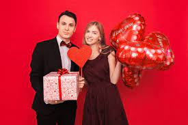 Couple in love, man and woman give each other gifts, holding gift boxes and  balloons | Happy valentine day quotes, Happy valentine, Happy valentines  day sms