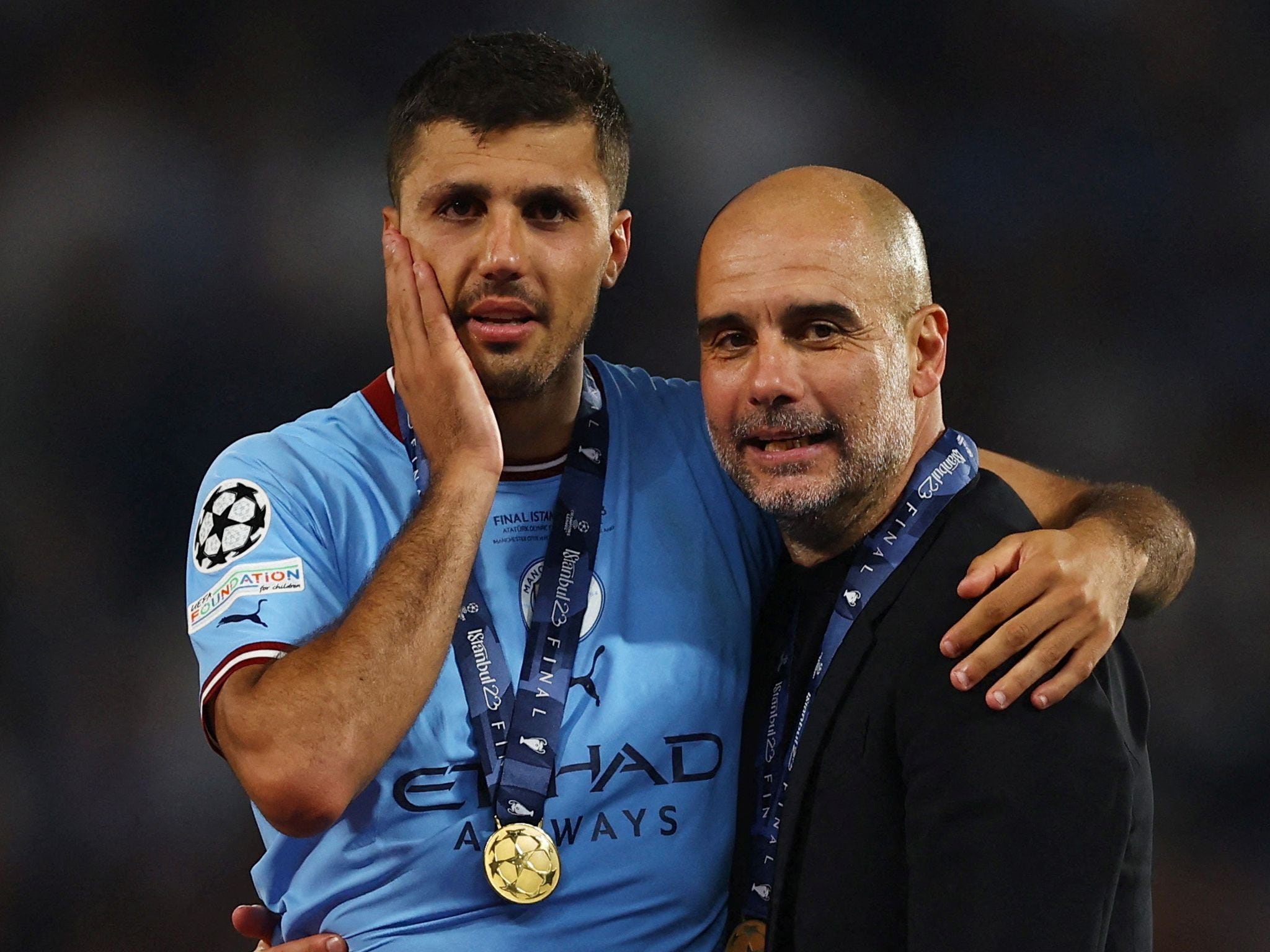 Soccer Football - Champions League Final - Manchester City v Inter Milan - Ataturk Olympic Stadium, Istanbul, Turkey - June 11, 2023 Manchester City's Rodri and manager Pep Guardiola celebrate after winning the Champions League REUTERS/Molly Darlington     TPX IMAGES OF THE DAY